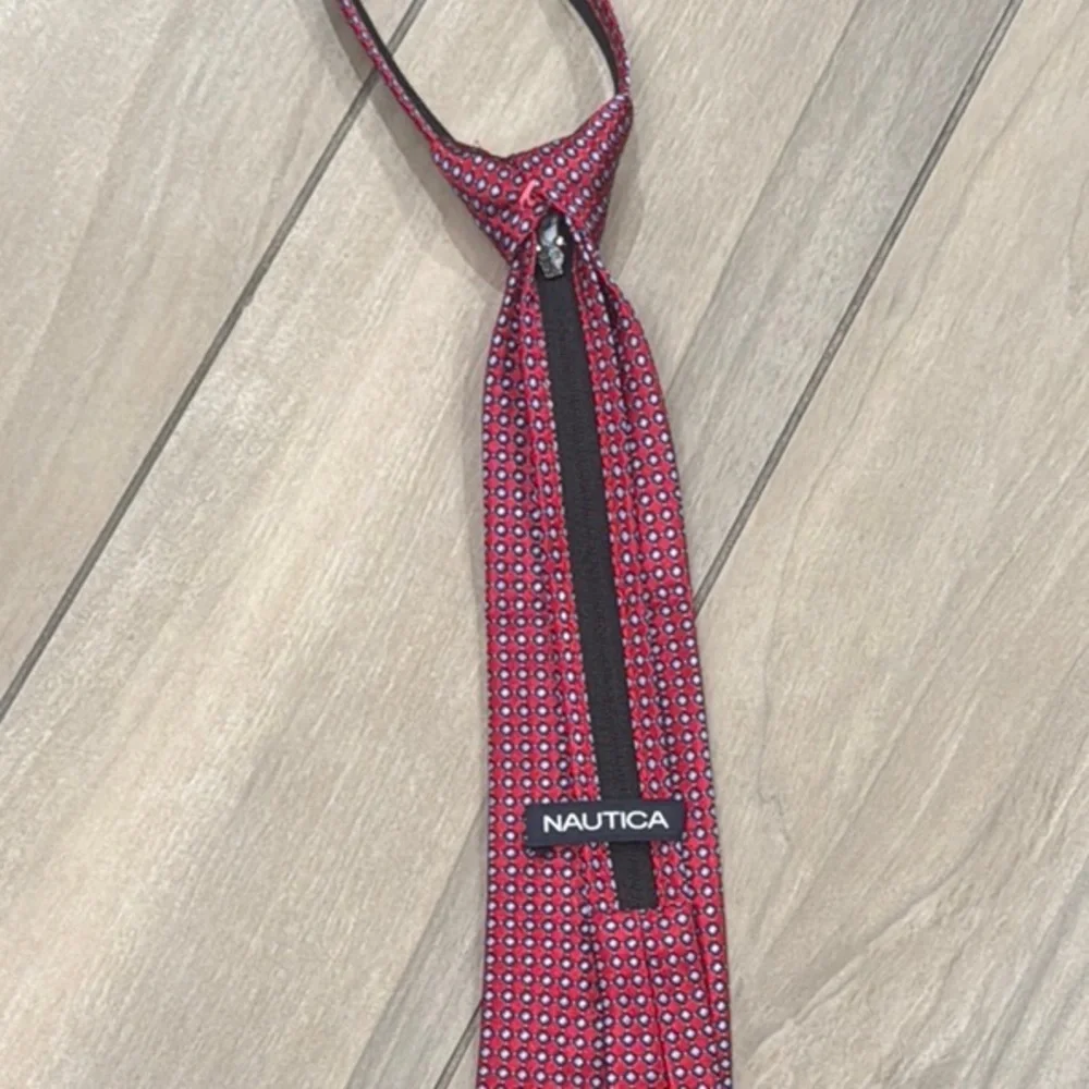 Boys Nautica Red Patterned Tie with adjustable zipper